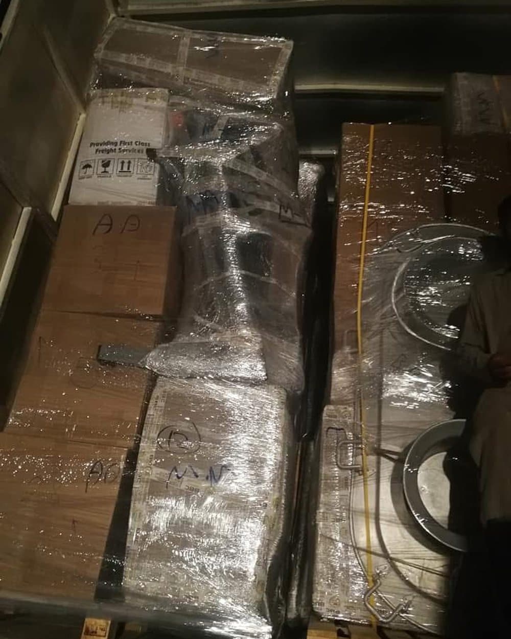 Wrapped goods inside a shipping container