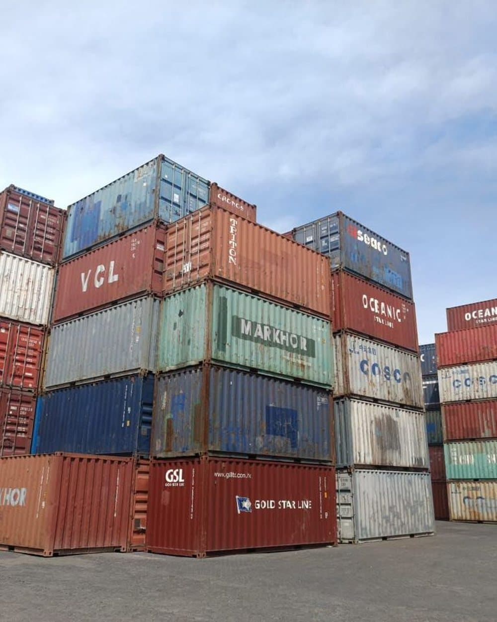 Shipping containers stacked in a yard