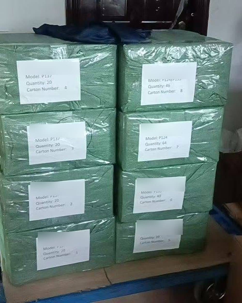 Numbered, wrapped cartons on a pallet