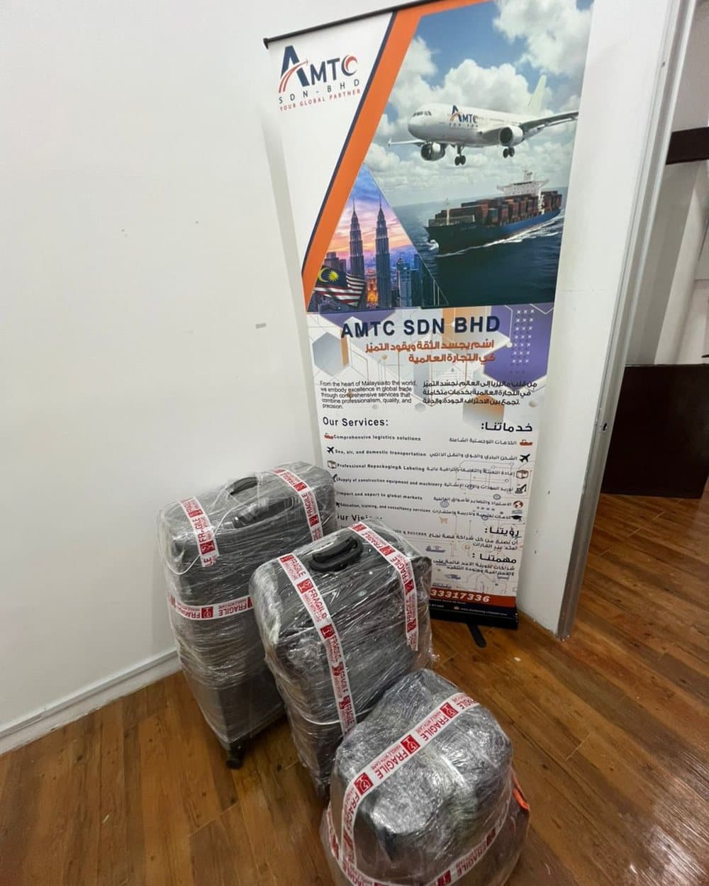 Wrapped suitcases at the AMTC office