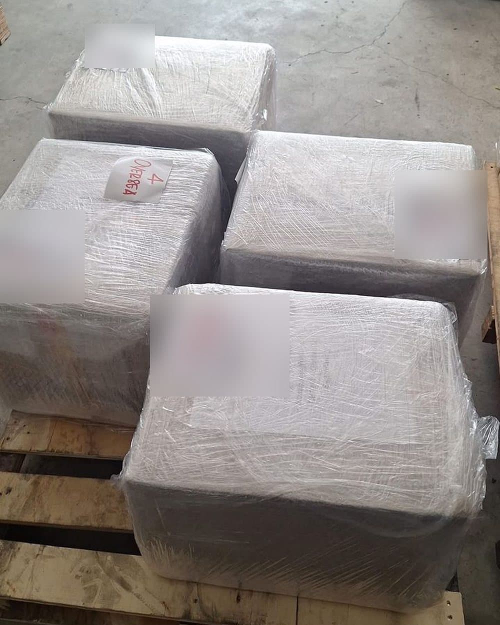 Wrapped boxes on a wooden pallet